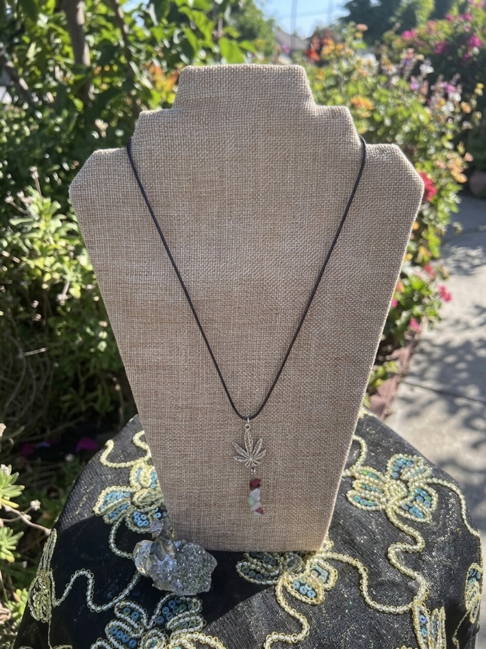 Handcrafted Black Cord Necklace with Silver Leaf Pendant and Red-White Bead